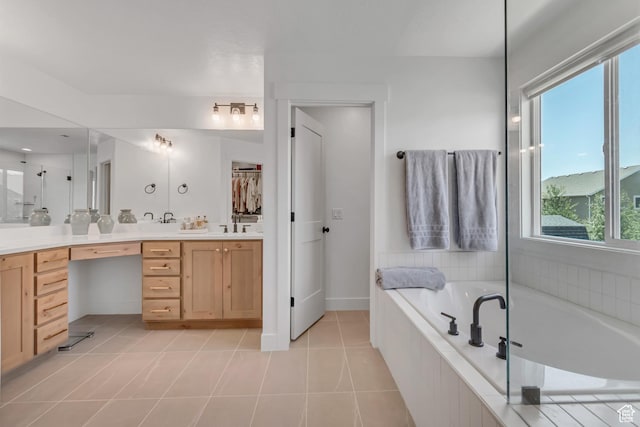 10948 S Samoa Dune Dr Unit 1027, South Jordan, UT 84009 - bathroom featuring vanity, a bath, tile patterned flooring, and a shower stall