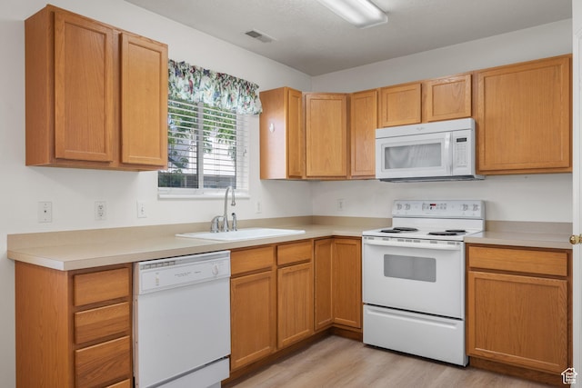 1520 W 300 S, Lehi, UT 84043 - kitchen with white appliances, light wood finished floors, and light countertops