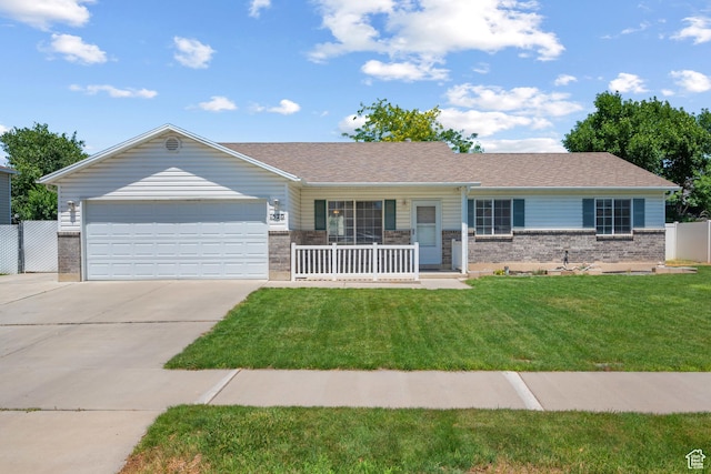 1520 W 300 S, Lehi, UT 84043 - ranch-style home with brick siding, concrete driveway, an attached garage, and covered porch