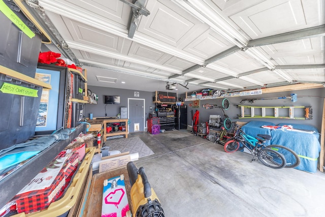 3762 W 4700 S, Roy, UT 84067 - garage featuring a workshop area and a garage door opener
