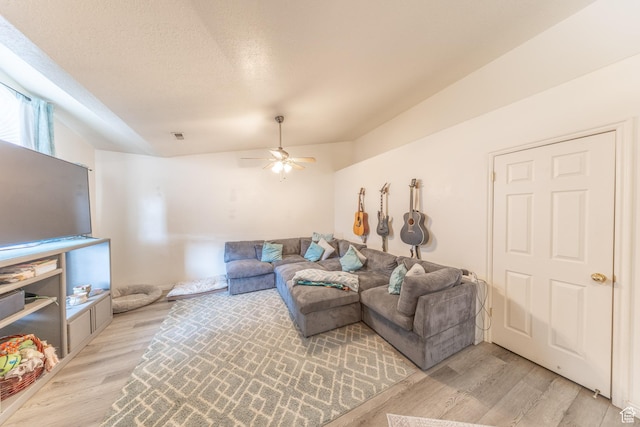 3762 W 4700 S, Roy, UT 84067 - living room featuring light wood finished floors, ceiling fan, and a textured ceiling