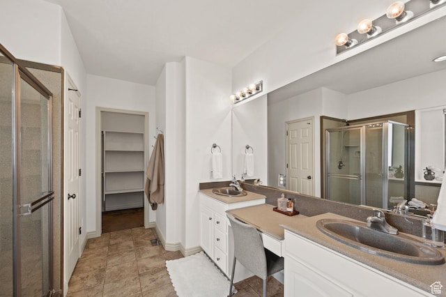 5155 S Alvera Dr E, Holladay, UT 84117 - bathroom featuring double vanity, a stall shower, and a closet