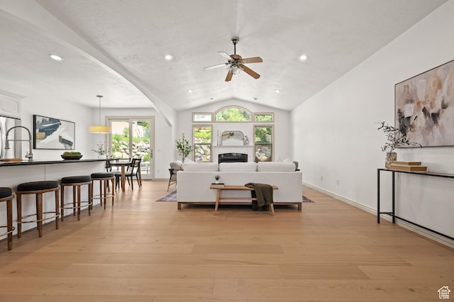 5155 S Alvera Dr E, Holladay, UT 84117 - living area with ceiling fan, vaulted ceiling, light wood-type flooring, and recessed lighting