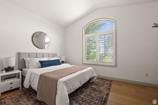 5155 S Alvera Dr E, Holladay, UT 84117 - bedroom with lofted ceiling and wood finished floors