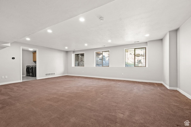 5155 S Alvera Dr E, Holladay, UT 84117 - unfurnished living room with washing machine and dryer, recessed lighting, carpet floors, and stairs