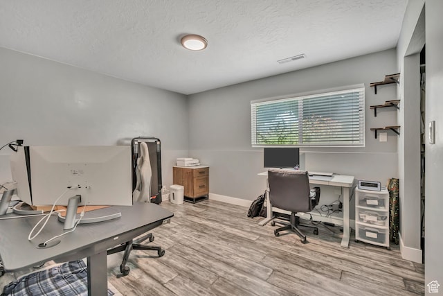 4851 S Woodbridge Dr Unit 38, Holladay, UT 84117 - office area with a textured ceiling and light wood finished floors