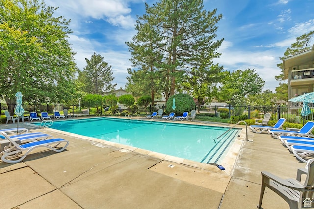 4851 S Woodbridge Dr Unit 38, Holladay, UT 84117 - community pool featuring a patio