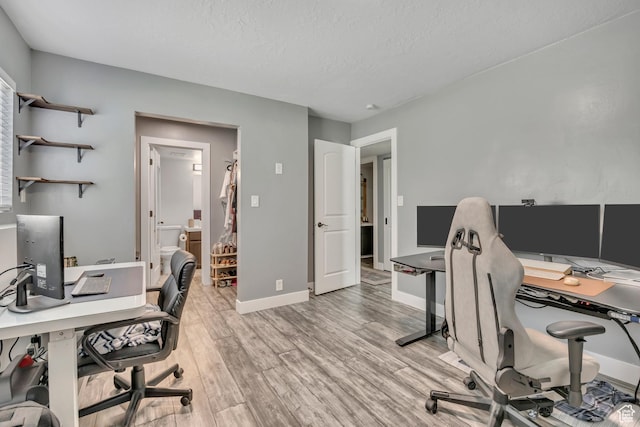 4851 S Woodbridge Dr Unit 38, Holladay, UT 84117 - office space featuring light wood-type flooring and a textured ceiling