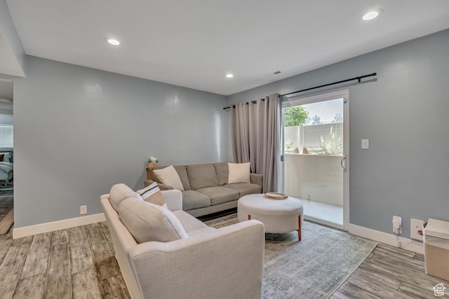 4851 S Woodbridge Dr Unit 38, Holladay, UT 84117 - living area with wood finished floors and recessed lighting