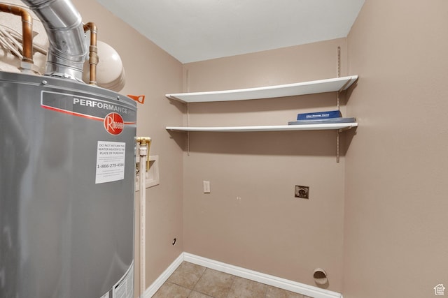 650 S Main St Unit 7103, Bountiful, UT 84010 - washroom with electric dryer hookup, gas water heater, washer hookup, and tile patterned flooring