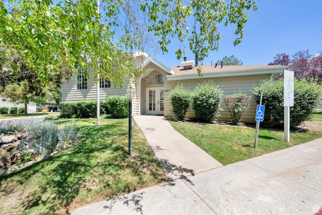 650 S Main St Unit 7103, Bountiful, UT 84010 - view of front of property featuring a front yard and french doors