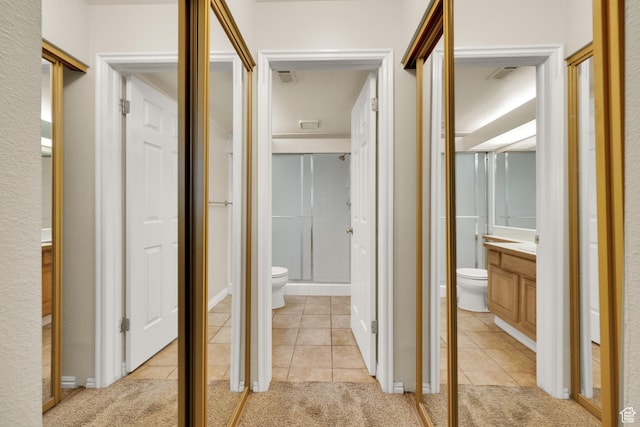 650 S Main St Unit 7103, Bountiful, UT 84010 - corridor with light tile patterned floors and light colored carpet