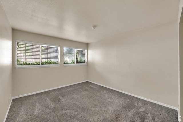 650 S Main St Unit 7103, Bountiful, UT 84010 - unfurnished room with dark colored carpet and a smoke detector