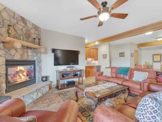 12069 N Sage Hollow Cir, Heber City, UT 84032 - living room with a ceiling fan, a stone fireplace, light stone finish floors, and beam ceiling