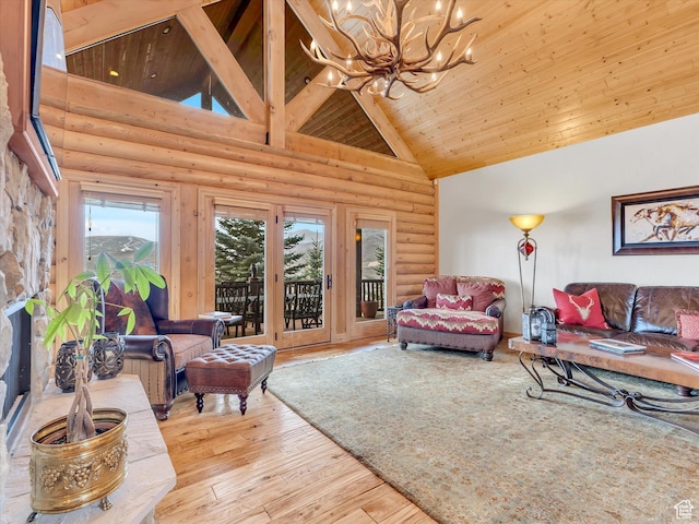 12069 N Sage Hollow Cir, Heber City, UT 84032 - living room featuring high vaulted ceiling, a chandelier, rustic walls, wood-type flooring, and wooden ceiling