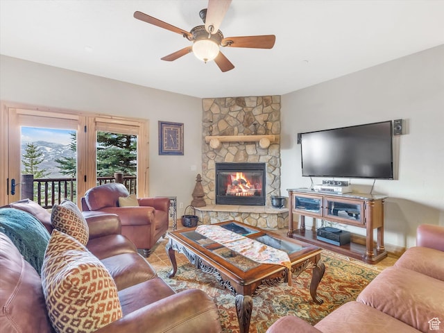 12069 N Sage Hollow Cir, Heber City, UT 84032 - living area featuring a fireplace and a ceiling fan