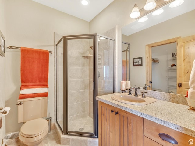 12069 N Sage Hollow Cir, Heber City, UT 84032 - bathroom with a shower stall, vanity, a walk in closet, and tile patterned flooring