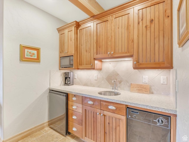 12069 N Sage Hollow Cir, Heber City, UT 84032 - kitchen featuring dishwashing machine, black microwave, decorative backsplash, light stone counters, and fridge