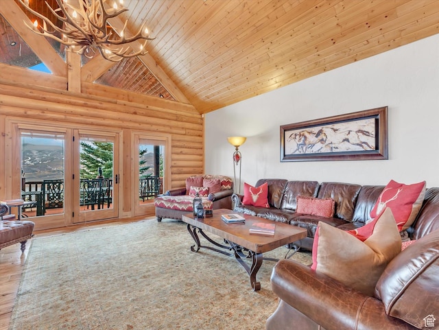 12069 N Sage Hollow Cir, Heber City, UT 84032 - living area with rustic walls, wood ceiling, high vaulted ceiling, wood finished floors, and a chandelier