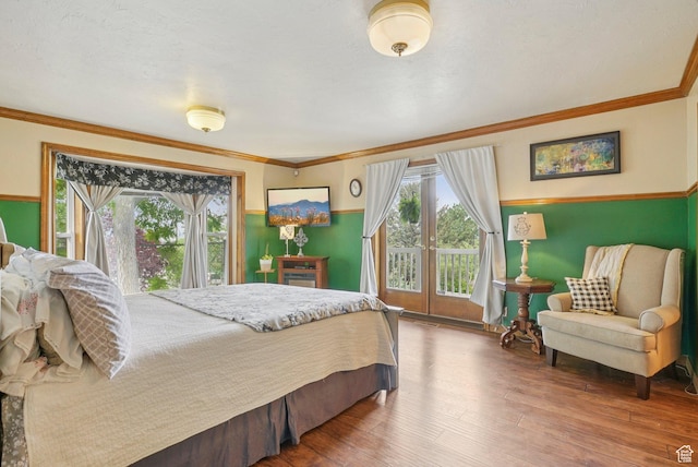 1174 Oakmont Ln, Provo, UT 84604 - bedroom with multiple windows, wood finished floors, crown molding, and access to exterior