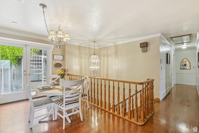 1174 Oakmont Ln, Provo, UT 84604 - dining area with a chandelier, hardwood / wood-style floors, crown molding, and attic access