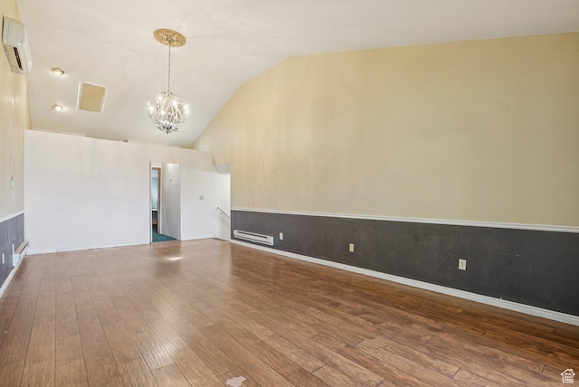 1174 Oakmont Ln, Provo, UT 84604 - unfurnished living room with a wall unit AC, a chandelier, lofted ceiling, and wood-type flooring