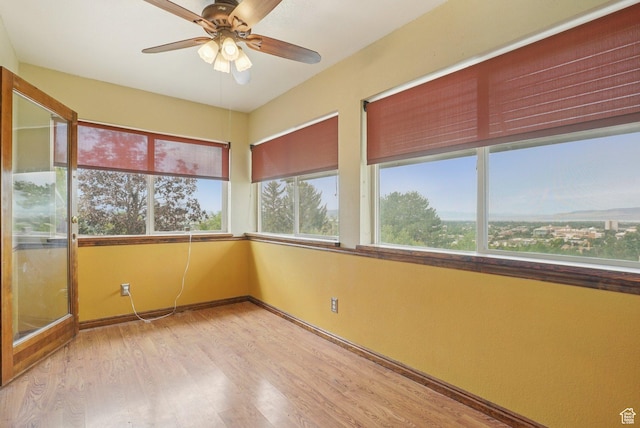 1174 Oakmont Ln, Provo, UT 84604 - unfurnished sunroom with wood finished floors and baseboards