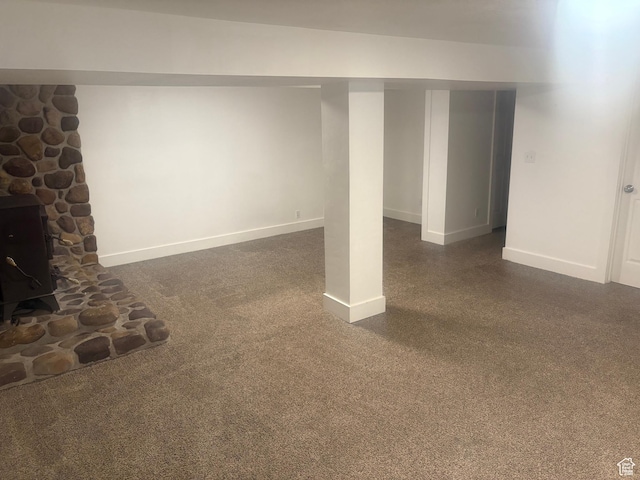 585 S 600 W, Heber City, UT 84032 - finished below grade area featuring baseboards and a wood stove