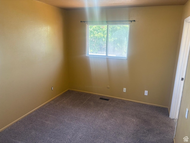 585 S 600 W, Heber City, UT 84032 - unfurnished room featuring dark colored carpet and baseboards