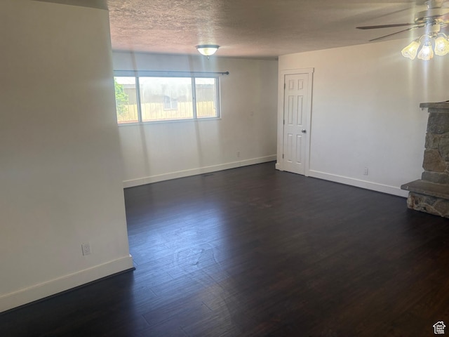 585 S 600 W, Heber City, UT 84032 - unfurnished living room featuring dark wood finished floors, a ceiling fan, and a textured ceiling