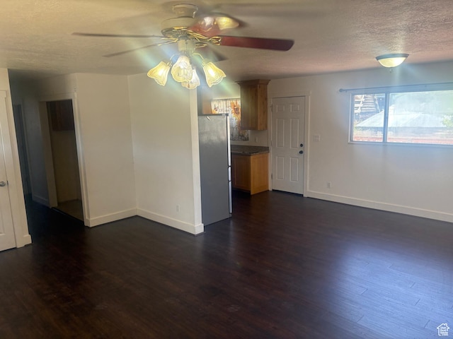 585 S 600 W, Heber City, UT 84032 - unfurnished living room with ceiling fan, a textured ceiling, and dark wood-style flooring
