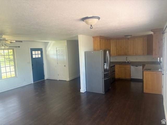 585 S 600 W, Heber City, UT 84032 - kitchen featuring stainless steel appliances, dark wood-style floors, ceiling fan, a textured ceiling, and open floor plan