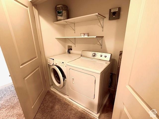 4276 S Main St W Unit 210, Murray, UT 84107 - washroom with washing machine and clothes dryer and carpet flooring
