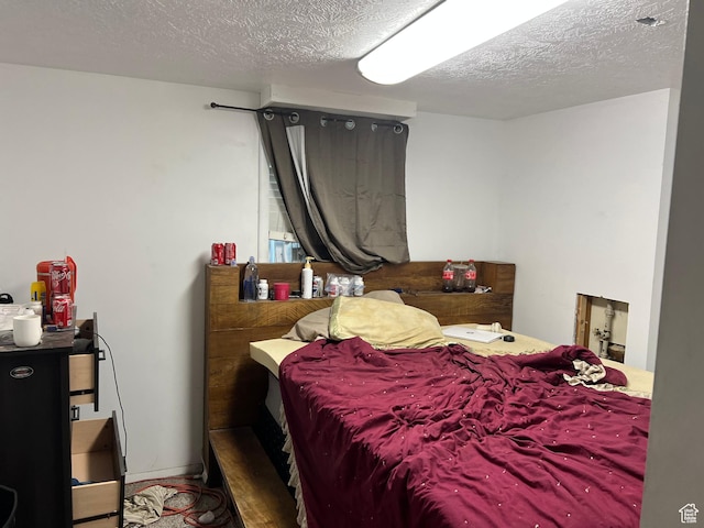 5724 W Darle Ave S, West Valley City, UT 84128 - bedroom with a textured ceiling
