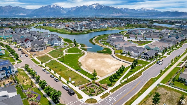 10253 S Clarks Hill Dr, South Jordan, UT 84009 - aerial overview of property's location with nearby suburban area and a water and mountain view