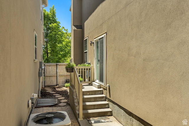10253 S Clarks Hill Dr, South Jordan, UT 84009 - view of property exterior with stucco siding and a central air condition unit