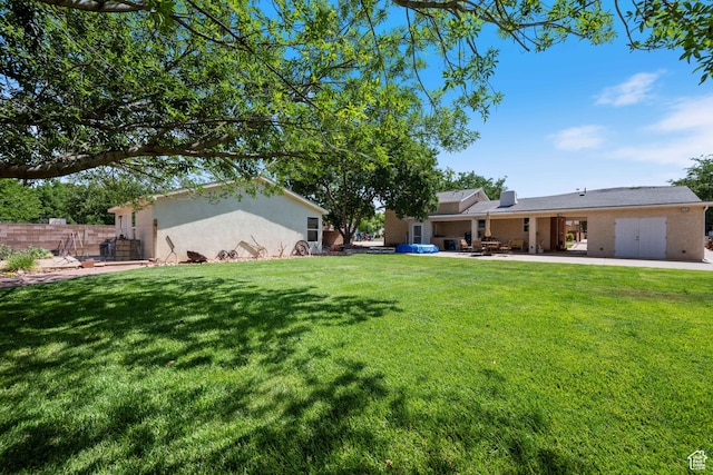 320 S 460 W, Hurricane, UT 84737 - view of green lawn featuring a patio
