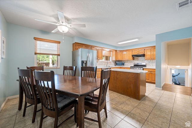 320 S 460 W, Hurricane, UT 84737 - dining room featuring ceiling fan and light tile patterned floors