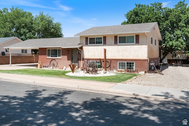 320 S 460 W, Hurricane, UT 84737 - view of front of property with brick siding, driveway, and stucco siding