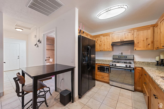 320 S 460 W, Hurricane, UT 84737 - kitchen with appliances with stainless steel finishes, under cabinet range hood, light tile patterned floors, light stone countertops, and a textured ceiling