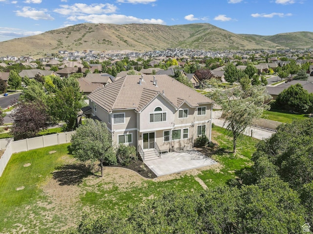 14318 S Butterfield Park Way, Herriman, UT 84096 - aerial perspective of suburban area with a mountain backdrop