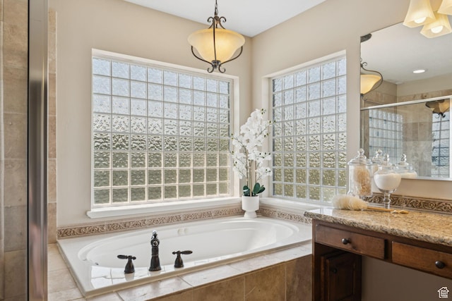 14318 S Butterfield Park Way, Herriman, UT 84096 - bathroom with plenty of natural light, a bath, and a stall shower
