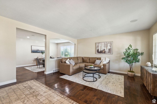 14318 S Butterfield Park Way, Herriman, UT 84096 - living room with arched walkways, hardwood / wood-style floors, and recessed lighting