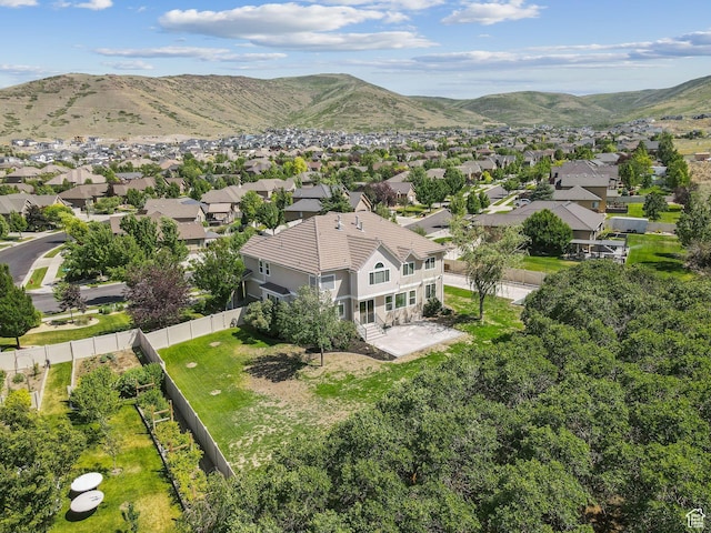 14318 S Butterfield Park Way, Herriman, UT 84096 - aerial view of residential area with a mountain backdrop