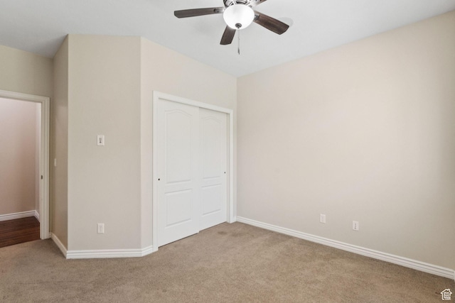 14318 S Butterfield Park Way, Herriman, UT 84096 - unfurnished bedroom with carpet flooring, a closet, and a ceiling fan