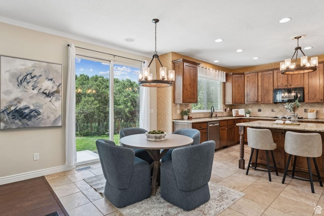 14318 S Butterfield Park Way, Herriman, UT 84096 - dining room with a chandelier, recessed lighting, and light tile patterned floors