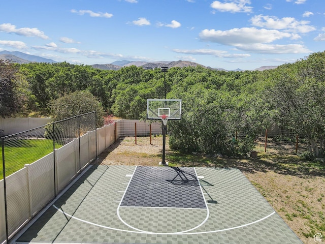 14318 S Butterfield Park Way, Herriman, UT 84096 - view of basketball court featuring basketball court and a mountain view
