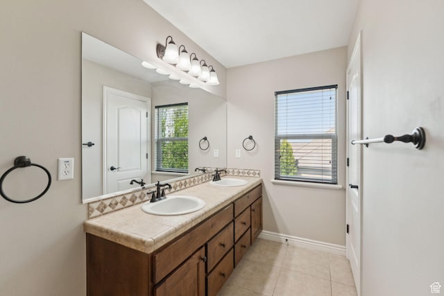 14318 S Butterfield Park Way, Herriman, UT 84096 - full bathroom featuring double vanity and tile patterned flooring