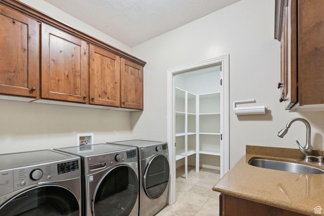 14318 S Butterfield Park Way, Herriman, UT 84096 - washroom featuring separate washer and dryer and cabinet space