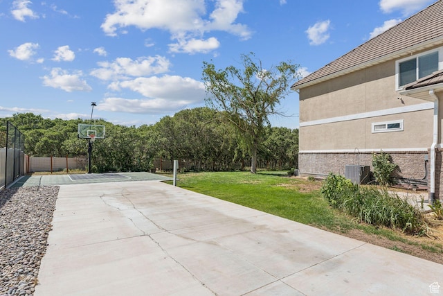14318 S Butterfield Park Way, Herriman, UT 84096 - view of patio featuring concrete driveway and basketball court